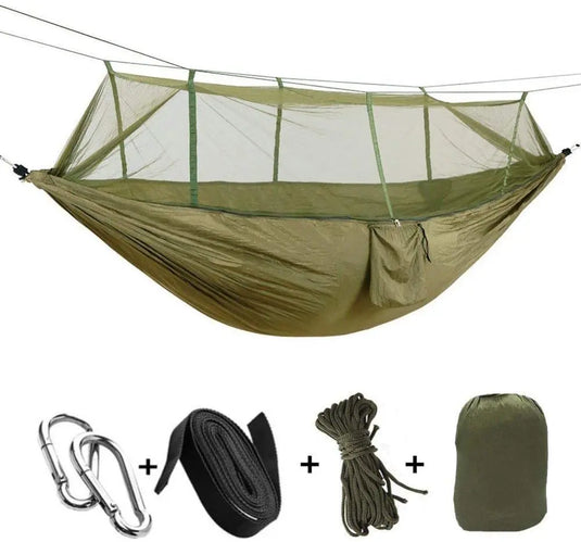 Hammock with mosquito net, ropes, carabiner, and carrying bag on a white background