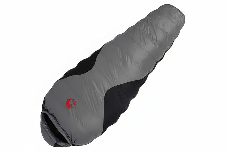 Load image into Gallery viewer, Gray sleeping bag with black interior on a white background
