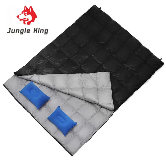 Black and gray quilt with blue pillows on a white background, featuring the Jungle King brand.