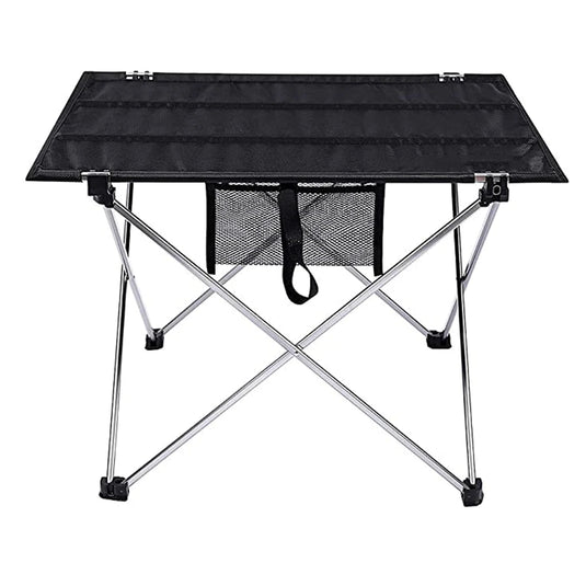 Black folding table with metal legs on a white background