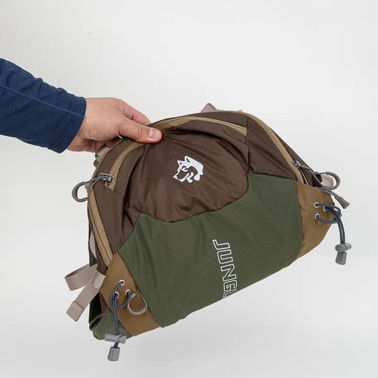 Brown and green backpack with a visible brand logo on a white background