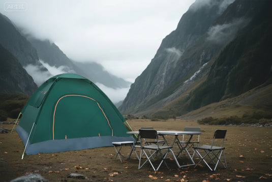 A table near a green tent in a mountainous area.