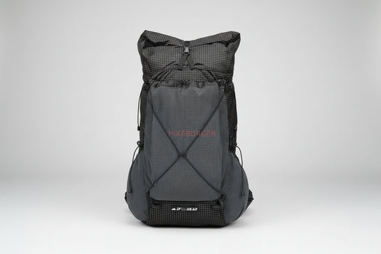 Black outdoor backpack with visible brand logo on a white background