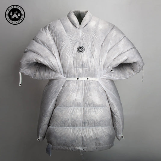 Gray puffer coat with a brand logo on a gray background