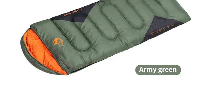 Load image into Gallery viewer, Green sleeping bag with orange interior on a white background, featuring product details.
