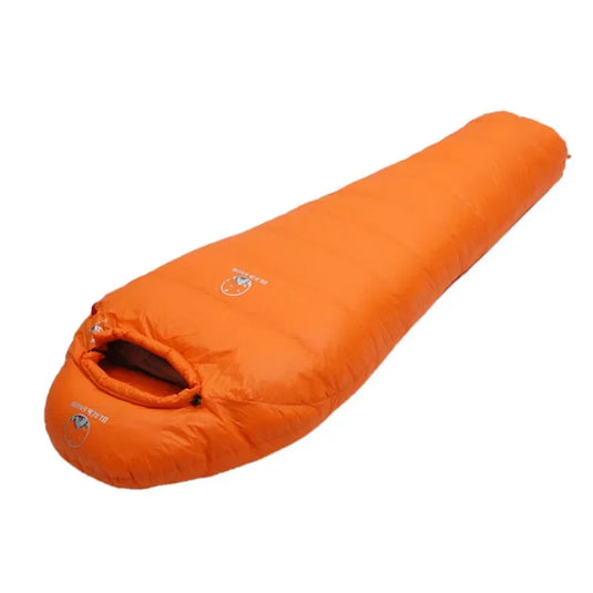 Orange sleeping bag on a white background