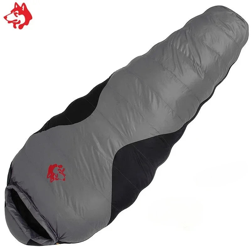 Load image into Gallery viewer, Gray sleeping bag with red logo on a white background
