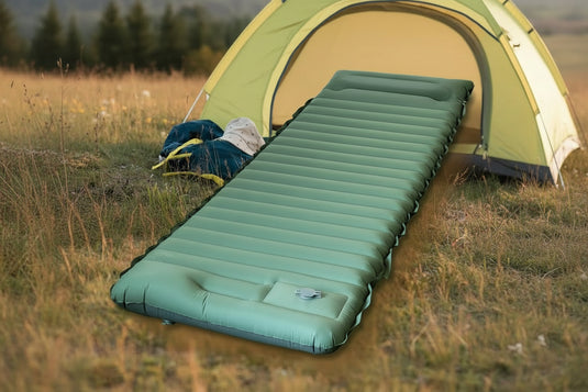 Compact inflatable camping mattress with dimensions and weight information on a natural background