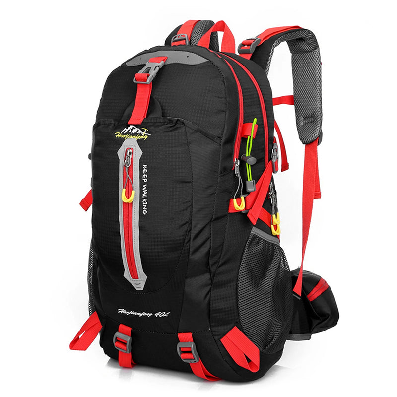 Load image into Gallery viewer, Black and red backpack with visible branding on a white background
