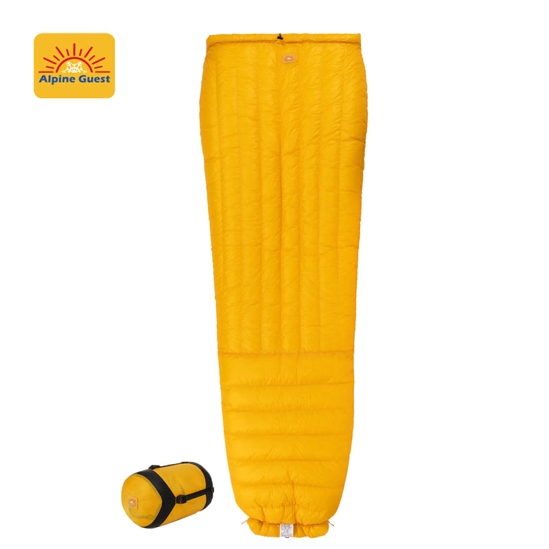 Load image into Gallery viewer, Yellow sleeping bag with Alpine Guest logo on a white background

