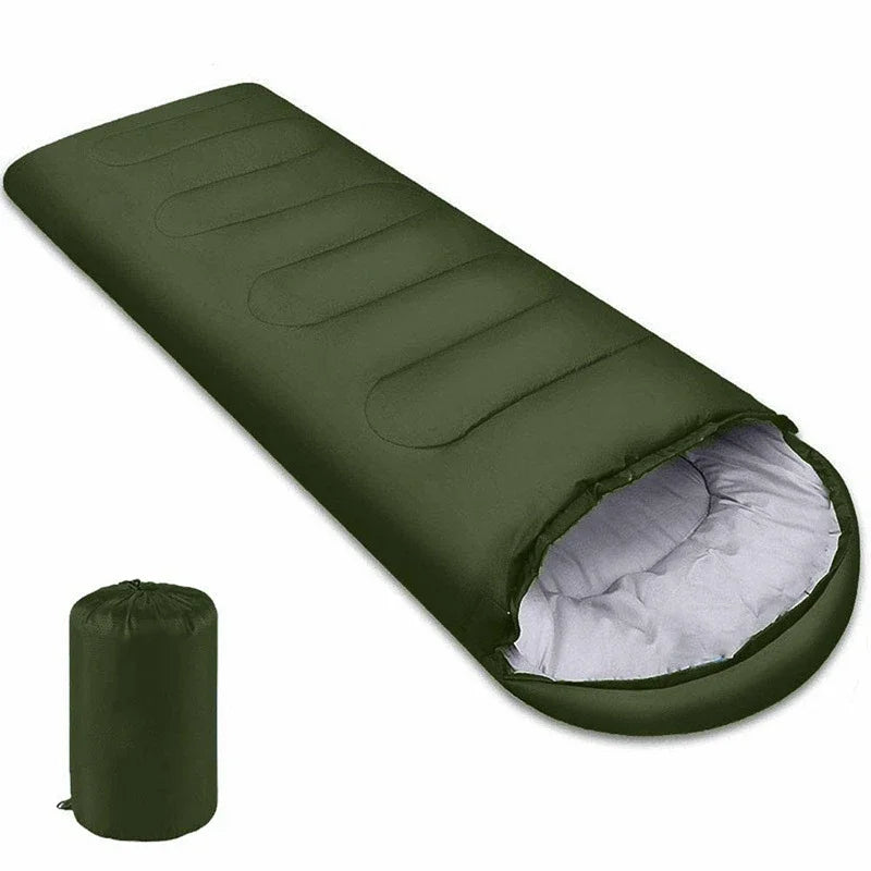 Load image into Gallery viewer, Green sleeping bag with white interior on a white background

