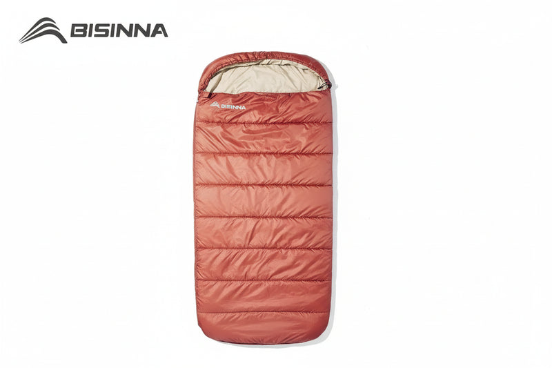 Load image into Gallery viewer, A red sleeping bag with BISINNA branding
