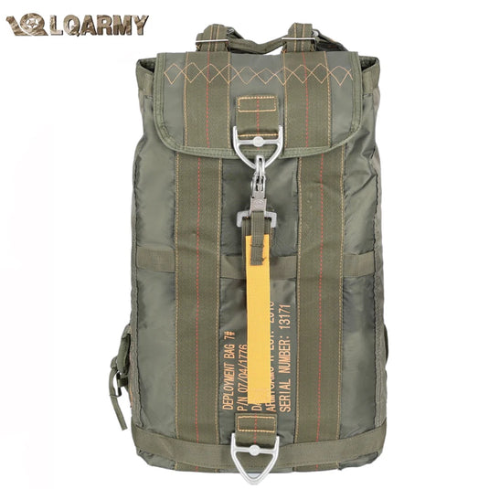 Green backpack with a yellow tag on a white background, featuring the LQARMY brand.