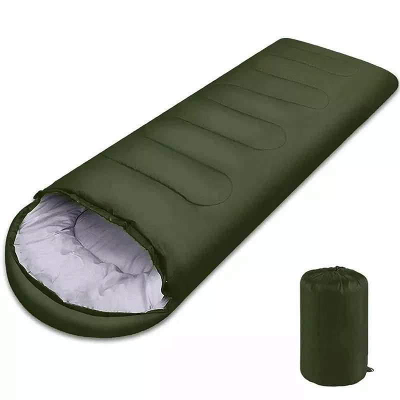 Load image into Gallery viewer, Green sleeping bag with white interior on a white background
