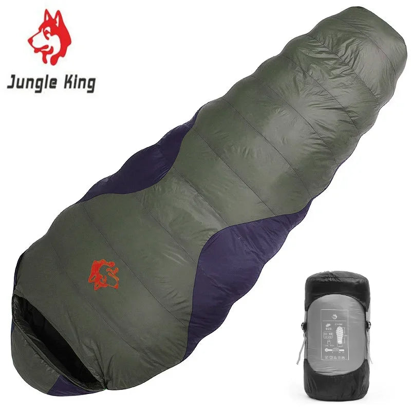 Load image into Gallery viewer, Green and purple sleeping bag with Jungle King logo on a white background
