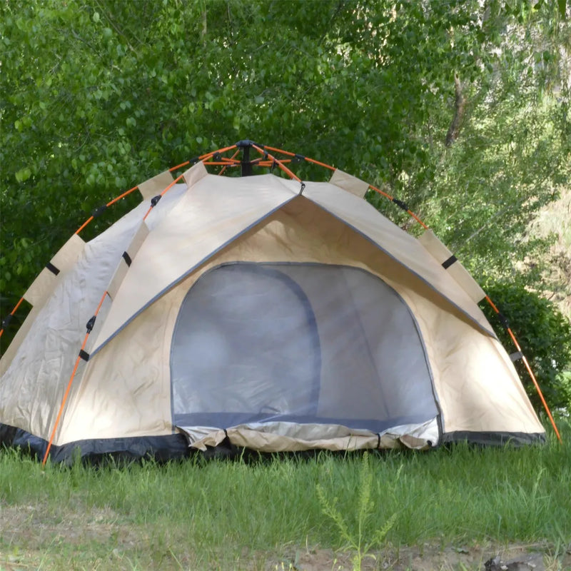 Load image into Gallery viewer, Beige camping tent with a screen door on grass with trees in the background
