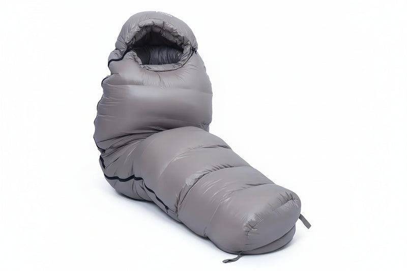Load image into Gallery viewer, A gray sleeping bag on a white background
