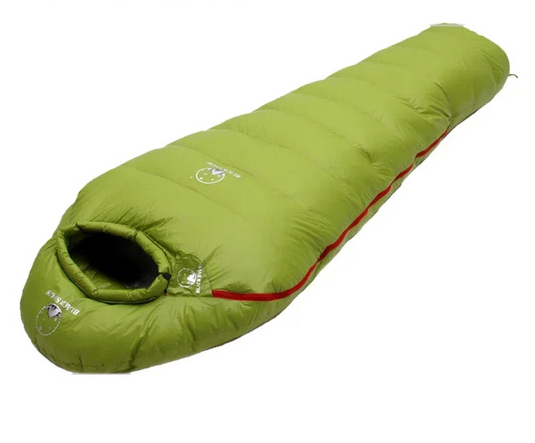 Green sleeping bag with red interior on a white background