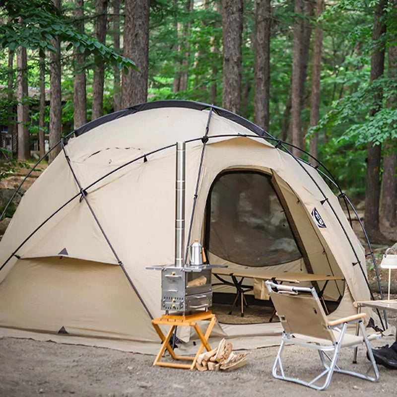 Load image into Gallery viewer, Beige camping tent with outdoor furniture in a forest setting
