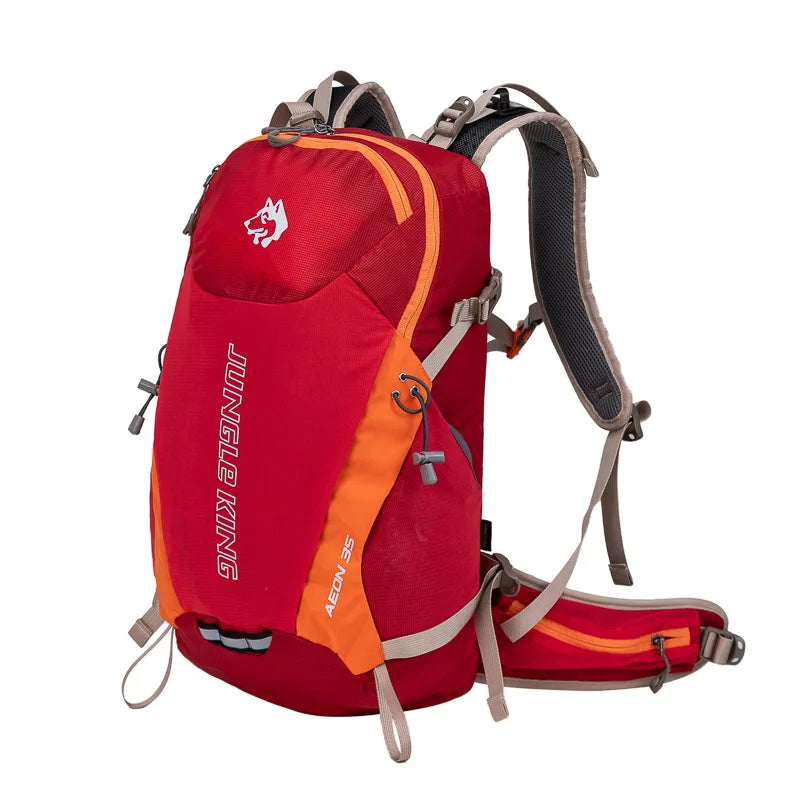 Load image into Gallery viewer, Red and orange hiking backpack with visible brand logo on a white background
